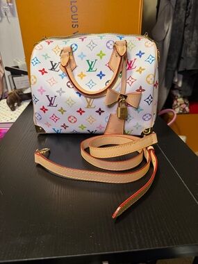 Gorgeous multi color top handle satchel